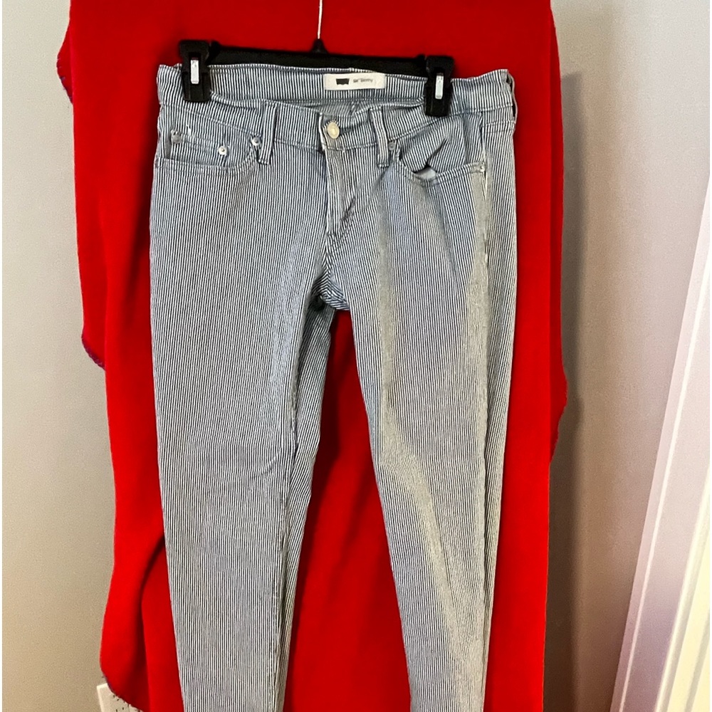 Brand: Levi’s                                         Size 9M (Blue Striped)
